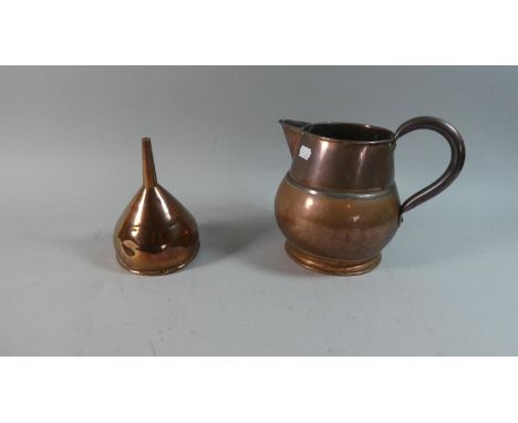 A 19th Century Copper Ale Jug and a Wine Funnel, 22.5cm and 17.5cm High 