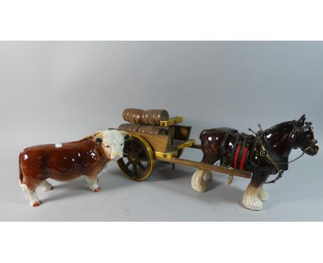 A Ceramic Model of a Horned Hereford Bull Together with a Model of a Horse and Brewers Cart 