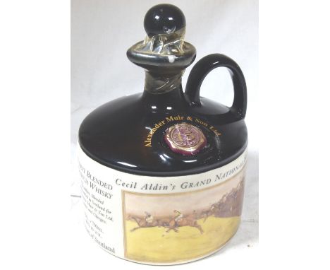 GRAND NATIONAL WHISKY DECANTER. Bottle of Cecil Aldin Grand National Whisky decanter with contents,