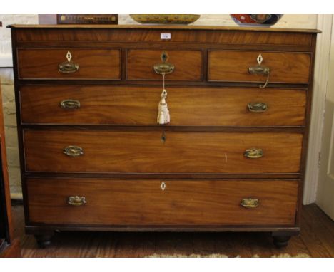 An early 19th century mahogany and cross banded chest of drawers with string ivory inlay to top and frieze, three small and t