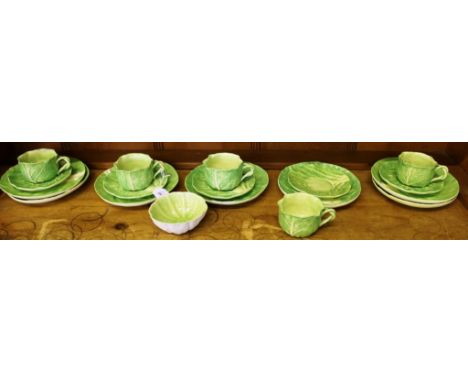 A Dodie Thayer green-glazed pottery cabbage leaf tea service, comprising five cups, five saucers, seven side plates with impr