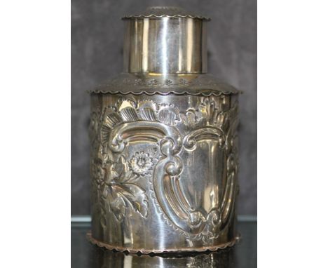 A Victorian silver tea caddy decorated in relief, Birmingham 1887 by Deacon and Franci, 119g