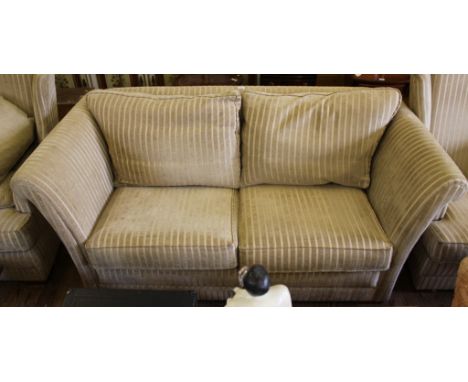 A contemporary fabric upholstered wood-framed two-seat sofa with removable cushions, 180cm wide