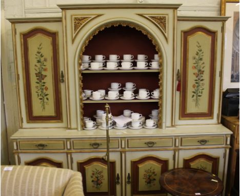 A 19th century-style French painted kitchen dresser with shaped cornice, central open shelving unit with two flanking cupboar