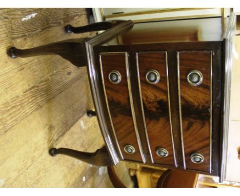 A Georgian-style mahogany bow fronted smaller chest of drawers or bedside locker with shaped top, three drawers under with ci