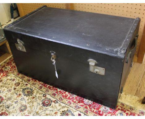 An early 20th century motorcar trunk with wood, metal and leather fittings, 36H x 72W x 43cmD