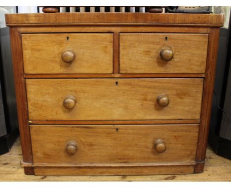 A Victorian mahogany chest of two small and two long drawers with shaped top, circular turned handles on plinth, 78H x 94W x 