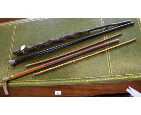 A Victorian Birmingham silver-topped lacquered walking stick and four other walking sticks (5)