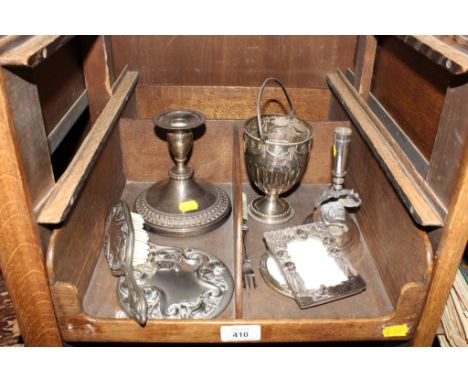 An assortment of eight silver plated items, to include hand mirror and brush, two small photograph frames, etc