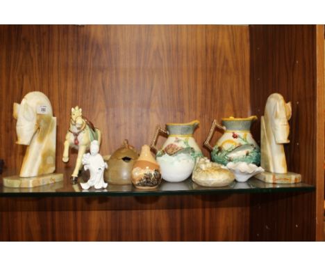 A COLLECTION OF STUDIO POTTERY, MAJOLICA STYLE JUGS ETC. together with a pair of onyx horse head book ends, ceramic horse fig