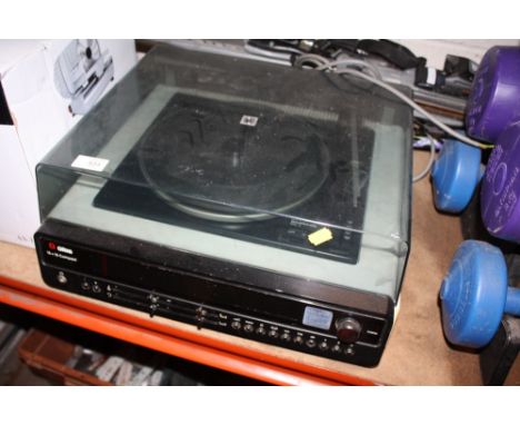 AN ULTRA GARRARD 620-S RECORD PLAYER