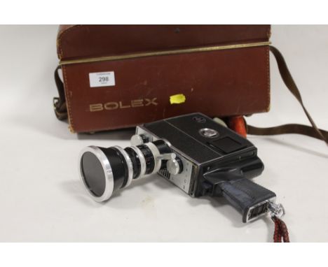 A PAILLARD BOLEX ZOOM REFLEX AUTOMATIC K2 CAMERA WITH CARRY CASE AND ACCESSORIES 