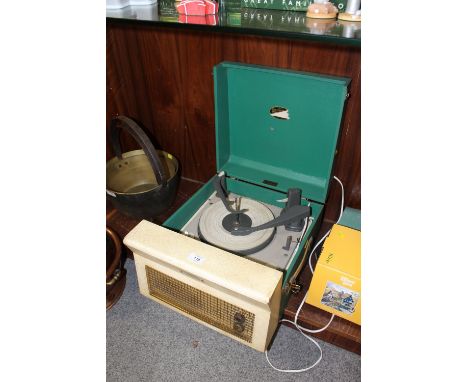 A RETRO VINTAGE GREEN DANSETTE PORTABLE RECORD PLAYER