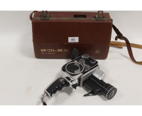 A VINTAGE PAILLARD BOLEX P1 ZOOM REFLEX CAMERA WITH CARRY CASE AND ACCESSORIES 