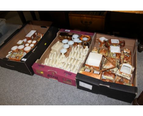 TWO TRAYS OF COTTAGE SHAPED CERAMIC TEA WARE together with a tray of Lurpak toast racks etc (3)