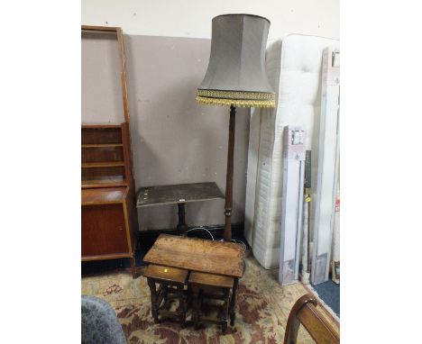 AN ANTIQUE OAK PEDESTAL TABLE TOGETHER WITH AN OAK STANDARD LAMP WITH SHADE &amp; A NEST OF TABLES (3)