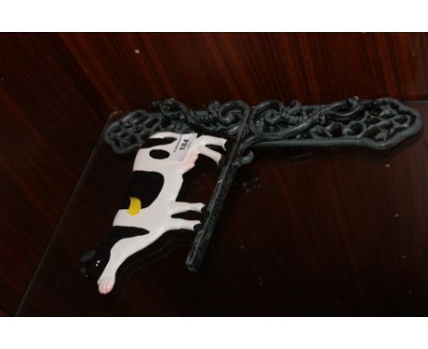 A MODERN CAST METAL COW BRACKET