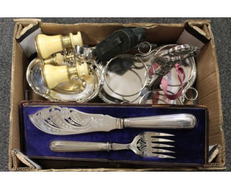 A TRAY OF MOSTLY SILVER PLATED METALWARE, OPERA GLASSES, FISH SERVING SETS ETC.