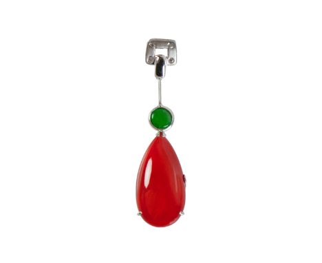The pendant features a teardrop-shaped coral and a  jade bead enhanced by cut diamonds. suspended by an 18k white gold chain 