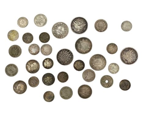 A collection of Commonwealth and World silver coinage. To include 2 x 1899 America one dime coins; 2 x Vatican 1 Lira, 1866 &