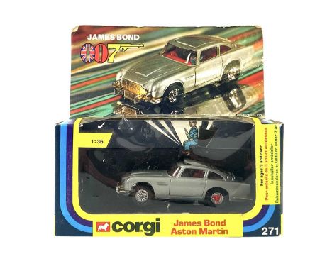 A Corgi No. 271 James Bond 007 Aston Martin. Metallic Silver with red interior, boxed.