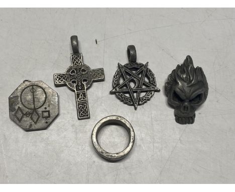 A selection of unusual pewter pendants and a ring 