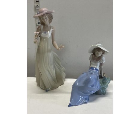 Two Nao figurines 