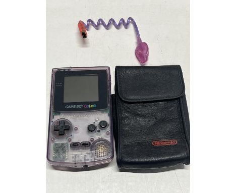 A Gameboy Color handheld console in working order with accessory and Nintendo leather case 