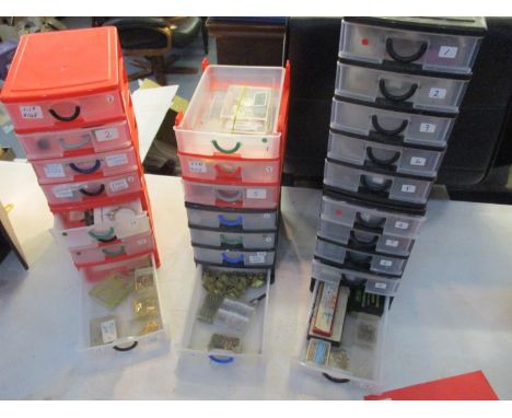 A quantity of vintage watch components to include stems, buttons, wheels, hands, train jewels and movements, together with so