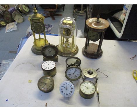 A S.Haller anniversary clock together with three other clocks and six clock movements to include a Henry Marc example A/FLoca