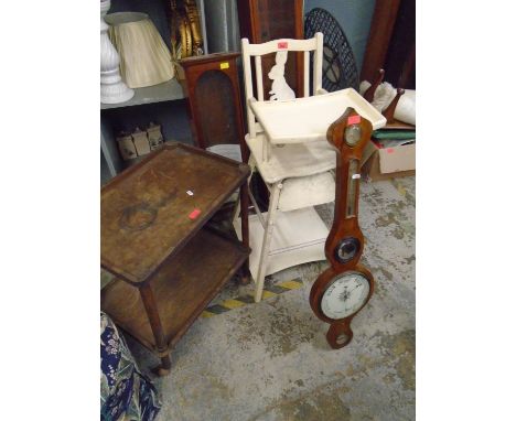 A cream painted wooden child's high chair with detachable tray, a two tier trolley, and a mercury-filled banjo barometer 