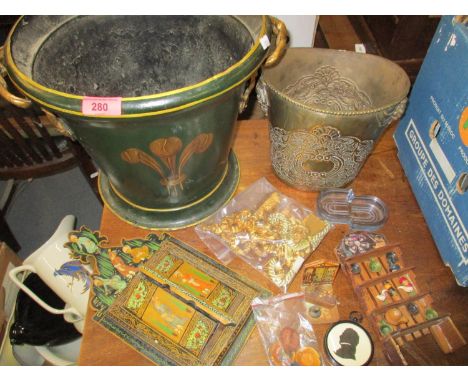 Decorative household items to include a green painted metallic planter with three feather design and twin handles, a silver p