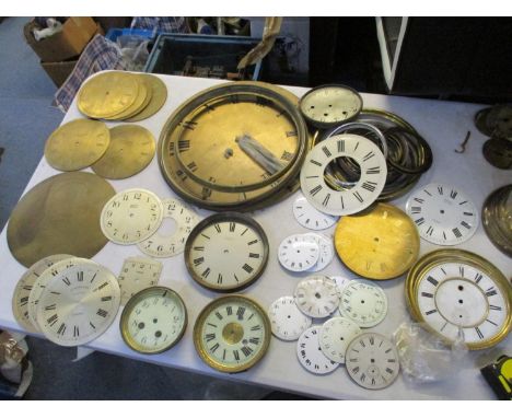 A quantity of early 20th century brass and enamel clock dials for electric and mechanical clocksLocation: RAF 
