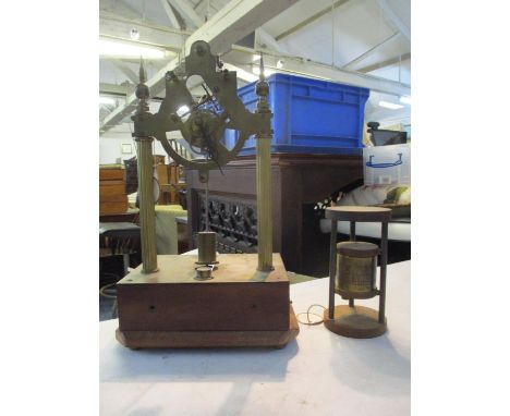 An early 20th century electric and mechanical mantel clock, together with a vintage alarm clock in the form of an hour glass 