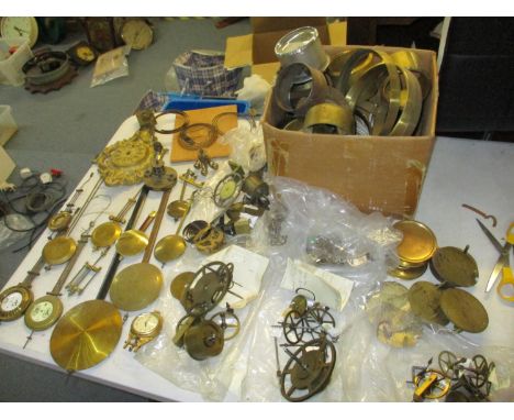 A quantity of clock parts to include pendulums, wheels, drum cases etcLocation: LA 