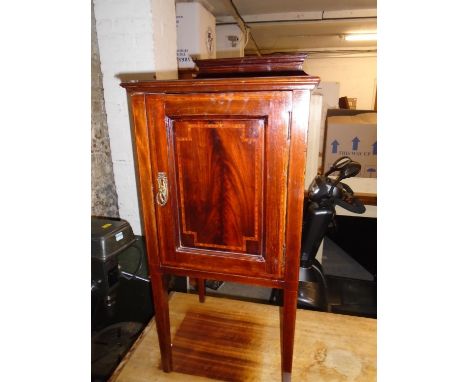 Edwardian inlaid mahogany pot cupboard with extended back, single door with internal shelves, on square tapering legs 