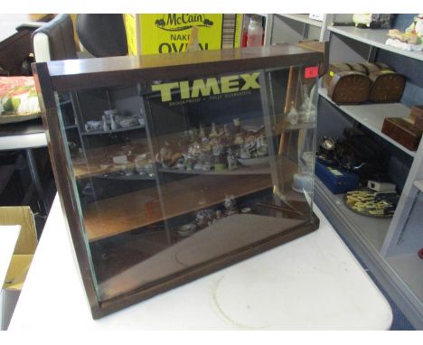 A vintage mahogany and glass shop display unit for Timex watches 46cm h x 58cm w x 18cm d Location: SL 