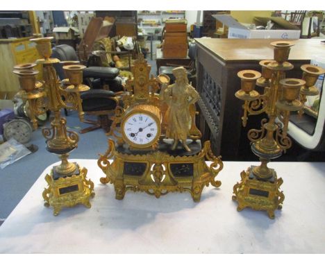An early 20th century French gilt spelter and marble mantel clock and garnitures, the dial signed 'Brun' Location: A3 