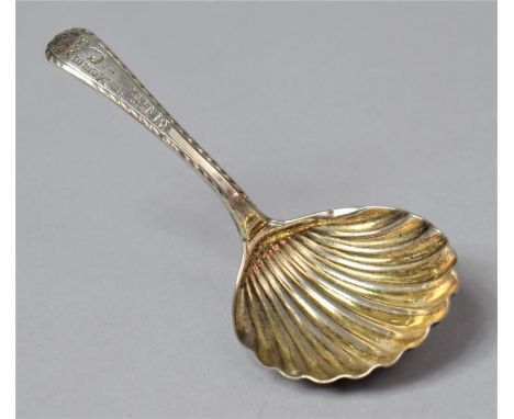 A Silver Shell Shaped Teacaddy Spoon by Taylor and Perry, the Handle Stamped in Memory of CG 