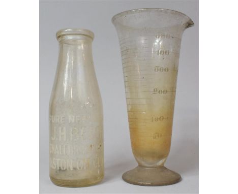 A Vintage Milk Bottle for J H Beech, Aston on Clun Together with a 19th Century Etched Glass Chemists Flask 