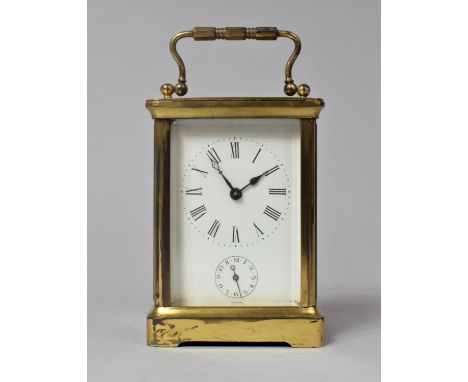 An Early 20th Century french Brass Carriage Clock of Small Proportions with Alarm Movement in need of Attention, 10.5cms High