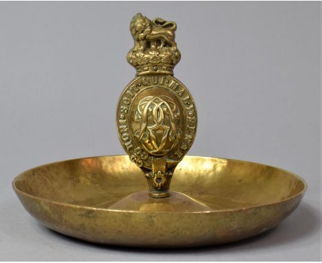 A Circular Brass Dish with Armorial Carrying Handle Having Royal Lion Finial, 16cm Diameter 
