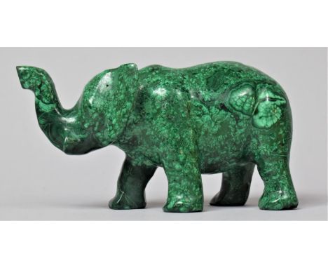 A Carved Green Stone (probably Malachite) Study of Elephant with Trunk in Salute, 14cm long 