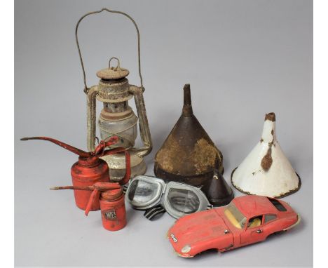 A Collection of Vintage Items to Include Two Oil Cans, Two Funnels, Hurricane, Model Car (AF), Goggles 
