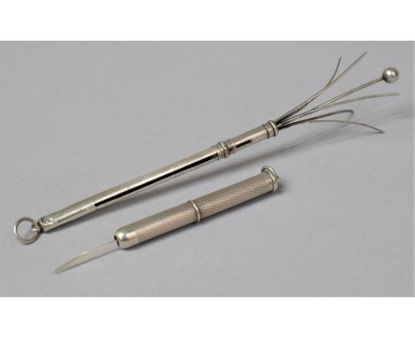 A Silver Swizzle Stick and a Silver Tooth Pick 