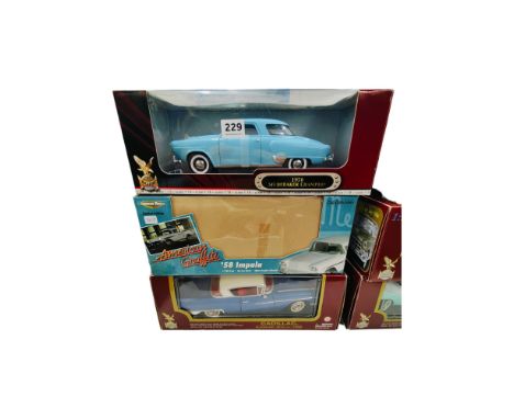 3 BOXED LARGER SCALE MODEL CARS 