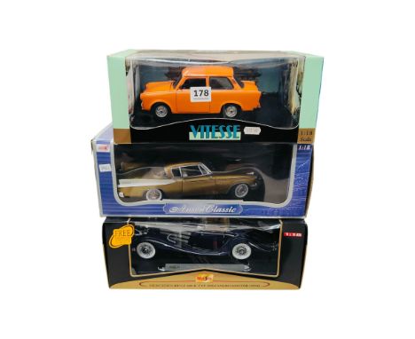 3 BOXED LARGER SCALE MODEL CARS 