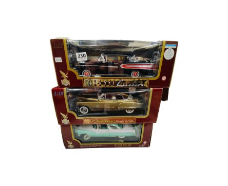 3 BOXED LARGER SCALE MODEL CARS 