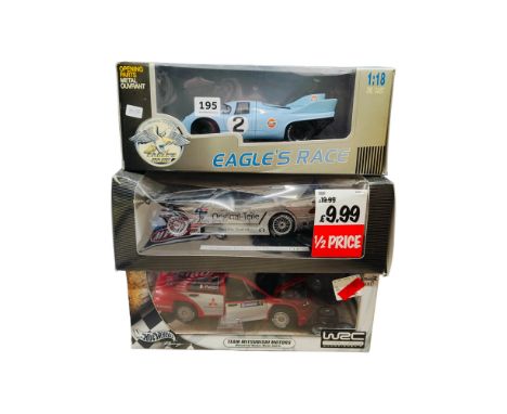 3 BOXED LARGER SCALE MODEL CARS 