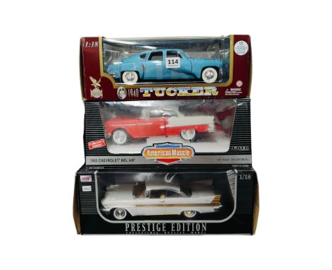 3 BOXED LARGER SCALE MODEL CARS 
